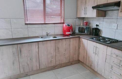 Secunda Apartment | Family-Friendly Reutlwane Gardens Apartments - Rated 9/10