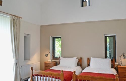 Pentrefelin House | Elegant Rhandir Long House: 5-Star, Family-Friendly Retreat