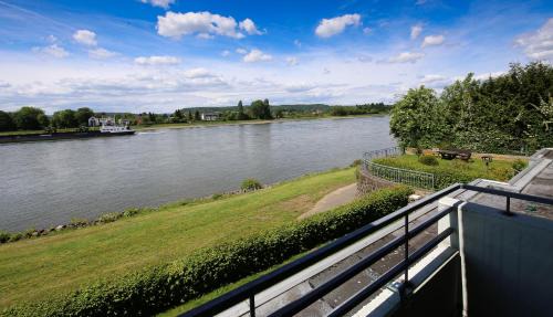 Linz am Rhein Apartment | RheinDesign River Promenade: Family & Pet Friendly Retreat
