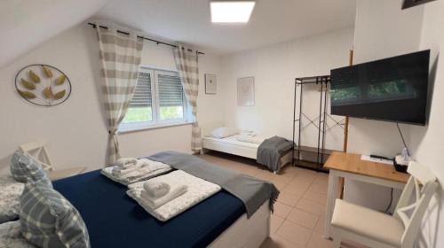 Urbar House | Relax at Rheinview Sunset with Hot Tub & Family Amenities