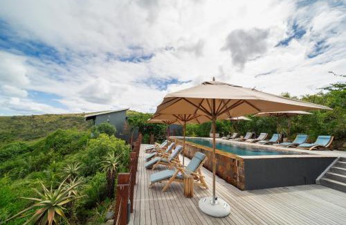 Hlabisa Cabin | Experience Rhino Ridge Safari Lodge with Oceanfront Views