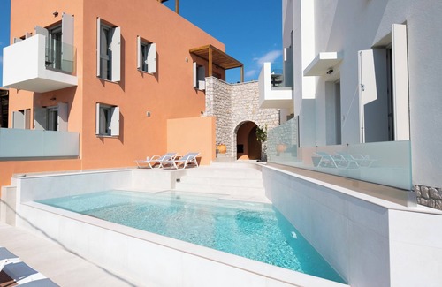 Ixia Apartment | Ocean View Retreat: Iviskos with Pool and Spa Amenities