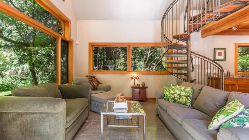 Langley House | Relax at Rhythm Waters Garden Paradise with Hot Tub Access