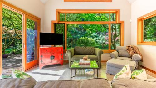 Langley House | Relax at Rhythm Waters Garden Paradise with Hot Tub Access