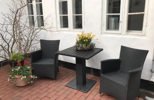 Ribe Apartment | Discover Ribe Sønderport Bed & Kitchen: Family-Friendly Stay