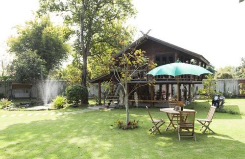 Hang Dong House | Inviting Rice Barn And Rooms with Oceanfront Pool Access