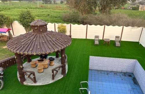 Faridabad House | Relax at Ridge Heaven Farm: Pet-Friendly Retreat with Pool