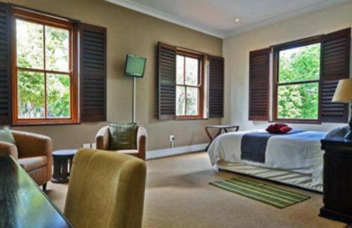 Trawal Bed & Breakfast | Discover Ridgemor Villa: Oceanfront Escape with Pool Access