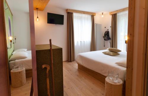 Molveno Cabin | Vibrant Stay at Rifugio La Montanara - Rated 9.6/10