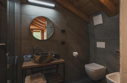 Madonna di Campiglio Hotel | Unforgettable Stay at Rifugio Lago Malghette: 10/10 Rated!