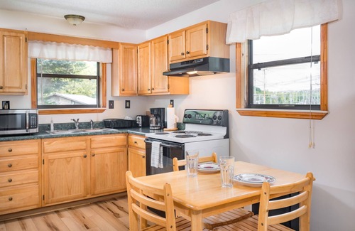 Cosby Cottage | Relax by the Waterfall: Jacuzzi, Porch & Spa Amenities