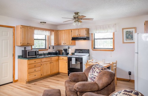 Cosby Cottage | Relax by the Waterfall: Jacuzzi, Porch & Spa Amenities