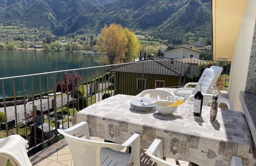 Idro Apartment | Lakefront Retreat: Breathtaking Views & Family-Friendly Amenities