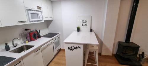 Villanua Apartment | Discover Rincón de Líerde: Family-Friendly with Pool Access