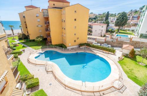 La Cala del Moral Apartment | Rincón Playa: Oceanfront Terrace with Pool & Top Ratings