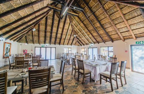 Hammanskraal Hotel | Discover Ritsako Game Lodge: Oceanfront Oasis with Spa