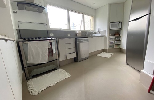 Bertioga Apartment | Seaside Retreat: 5 Bedrooms with Pool and Spa Amenities