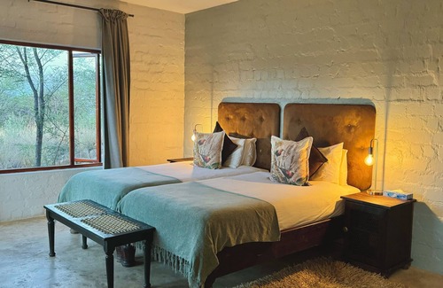 Windhoek Hotel | Highly Rated River Crossing Lodge with Family-Friendly Amenities