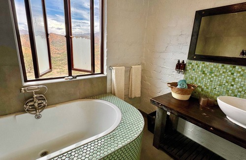 Windhoek Hotel | Highly Rated River Crossing Lodge with Family-Friendly Amenities