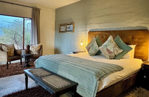 Windhoek Hotel | Highly Rated River Crossing Lodge with Family-Friendly Amenities