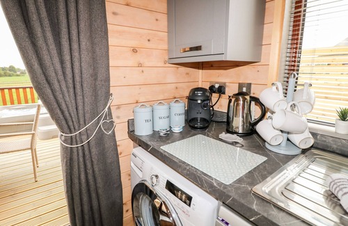 Scropton Cottage | Pet-Friendly River Dove Lodge with Hot Tub in Derbyshire
