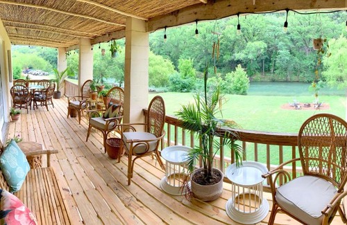 New Braunfels House | Bohemian-Style Riverfront Bungalow with Pet-Friendly Perks