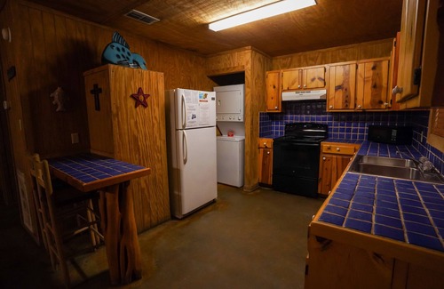 Sabinal Cabin | Cozy Riverfront Cabin with Shared Pool Access for Families