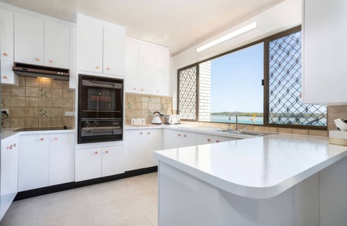 Maroochydore House | Peaceful River Front Escape Steps from Ocean Street