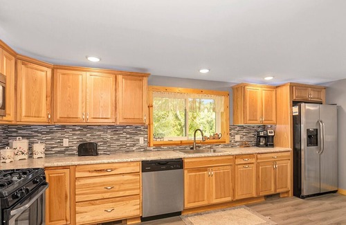 Newaygo Cottage | River Front Home with Breathtaking Views & Private Island