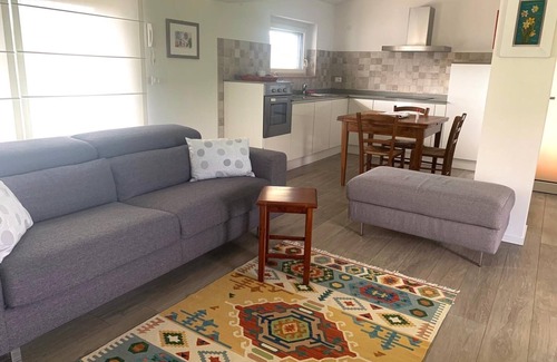 Ragogna Apartment | Serene River House Retreat with Lake View and Spa Amenities