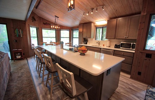 Crescent City House | River's Bend: Unforgettable Riverfront Escape with Spa & Views