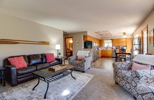 River West House | RiverBend Bungalow: Riverfront Retreat with Hot Tub & Wifi