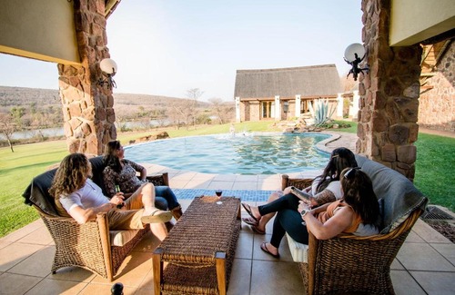 Vaalwater Cabin | Discover Riverdance Lodge: Family-Friendly & Poolside Fun