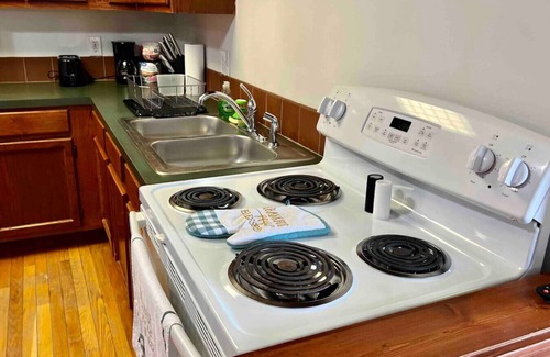 St. Joseph Cabin | Relaxing Riverfront Cabin with Jacuzzi and Family Amenities