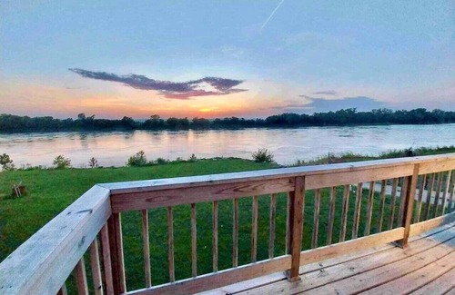 St. Joseph Cabin | Relaxing Riverfront Cabin with Jacuzzi and Family Amenities