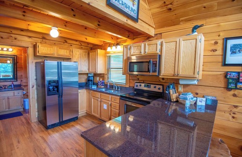 Piney Creek Cabin | Charming River Front Cabin with Hot Tub & Wi-Fi Access