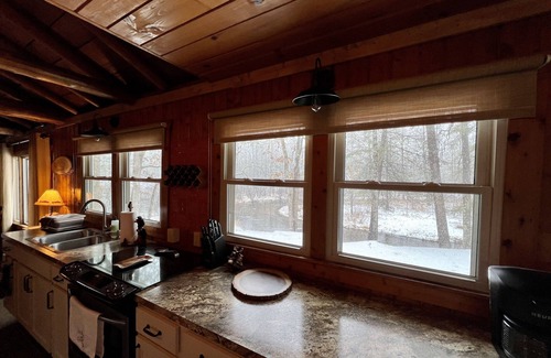 Baldwin Cabin | Secluded Riverfront Cabin with Ocean View & Child-Friendly Perks