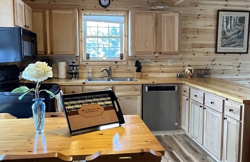 Luzerne Cabin | Cozy Brown Trout Lodge: Riverfront Retreat with Pool & Breakfast