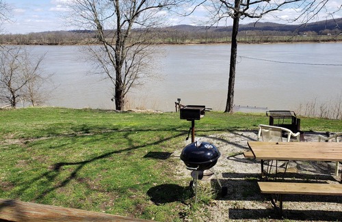 Derby Cabin | Pet-Friendly Riverfront Cabin with Hot Tub & Breakfast