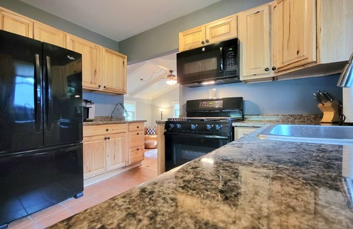 McHenry House | Riverfront Retreat: Pet Friendly with Spa & Ocean Views