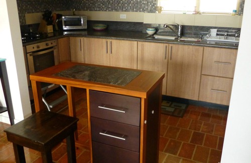 San Blas Condo | Experience Riverfront Living with Incredible Views in Cuenca