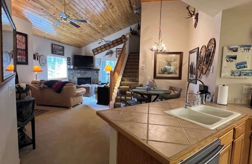 Breckenridge Condo | Relaxing Riverfront Retreat with Hot Tub and Fireplace