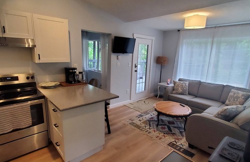 Duncan Cottage | Riverfront cottage with stairs to the river, firepit, and forested retreat.