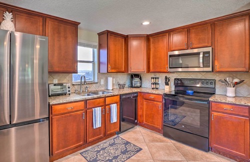 New Port Richey Cottage | Riverfront Retreat with Putting Green & Boat Dock - 9.8/10