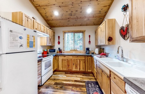 Joseph House | Riverside Retreat with Scenic Deck, Spa & Family Amenities