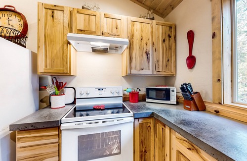 Joseph House | Riverside Retreat with Scenic Deck, Spa & Family Amenities