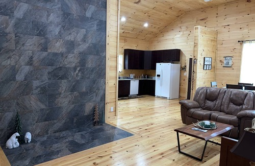 Newland Cabin | Exquisite Riverfront Log Cabin with Fire Pit & Deck