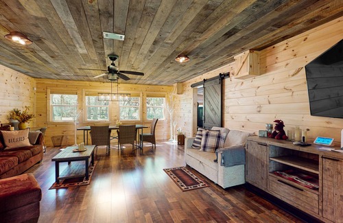 Cherry Log House | Pet-Friendly Riverfront Retreat with Game Room & Hot Tub