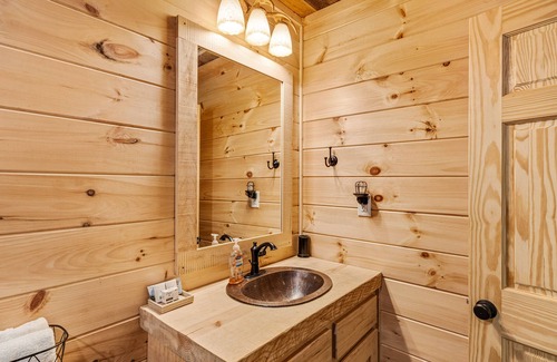 Cherry Log House | Pet-Friendly Riverfront Retreat with Game Room & Hot Tub