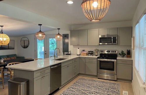 Fishers Hill House | Premier Riverfront Retreat with Spa and Ocean Views